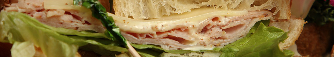 Eating Sandwich at Bruegger's Bagels restaurant in Newport Beach, CA.